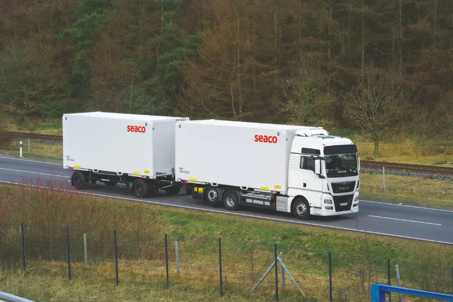 Seaco trucks carrying shipping containers